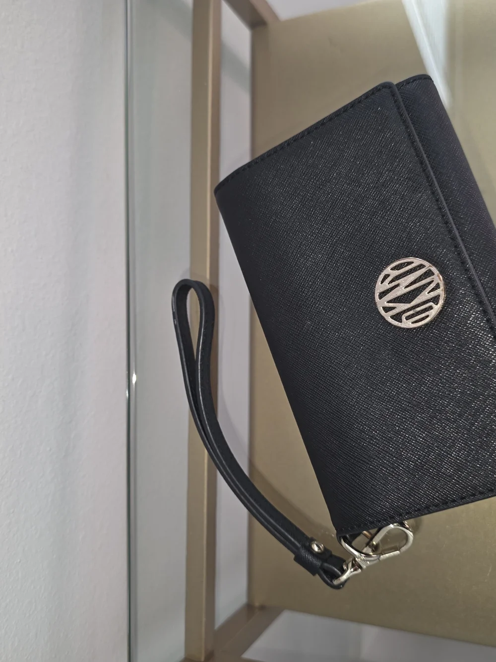 DKNY Black Leather Wristlet Clutch with Silver Logo Accent
